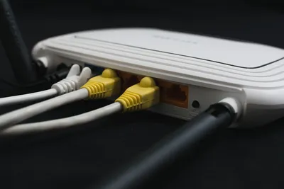 A white box with four wires connected to it.